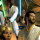 Five Jedi, including the Wookiee padawan Burryaga Agaburry, stand amid the flames of the Republic's Starlight Beacon station.